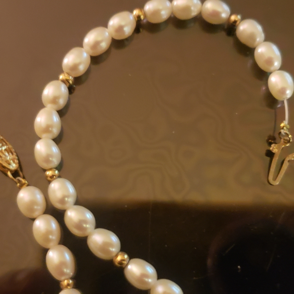 Gorgeous cultured pearl necklace with 14k spacers on a 14k gold